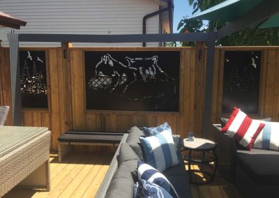 Decorative wolf design added into a custom backyard deck design